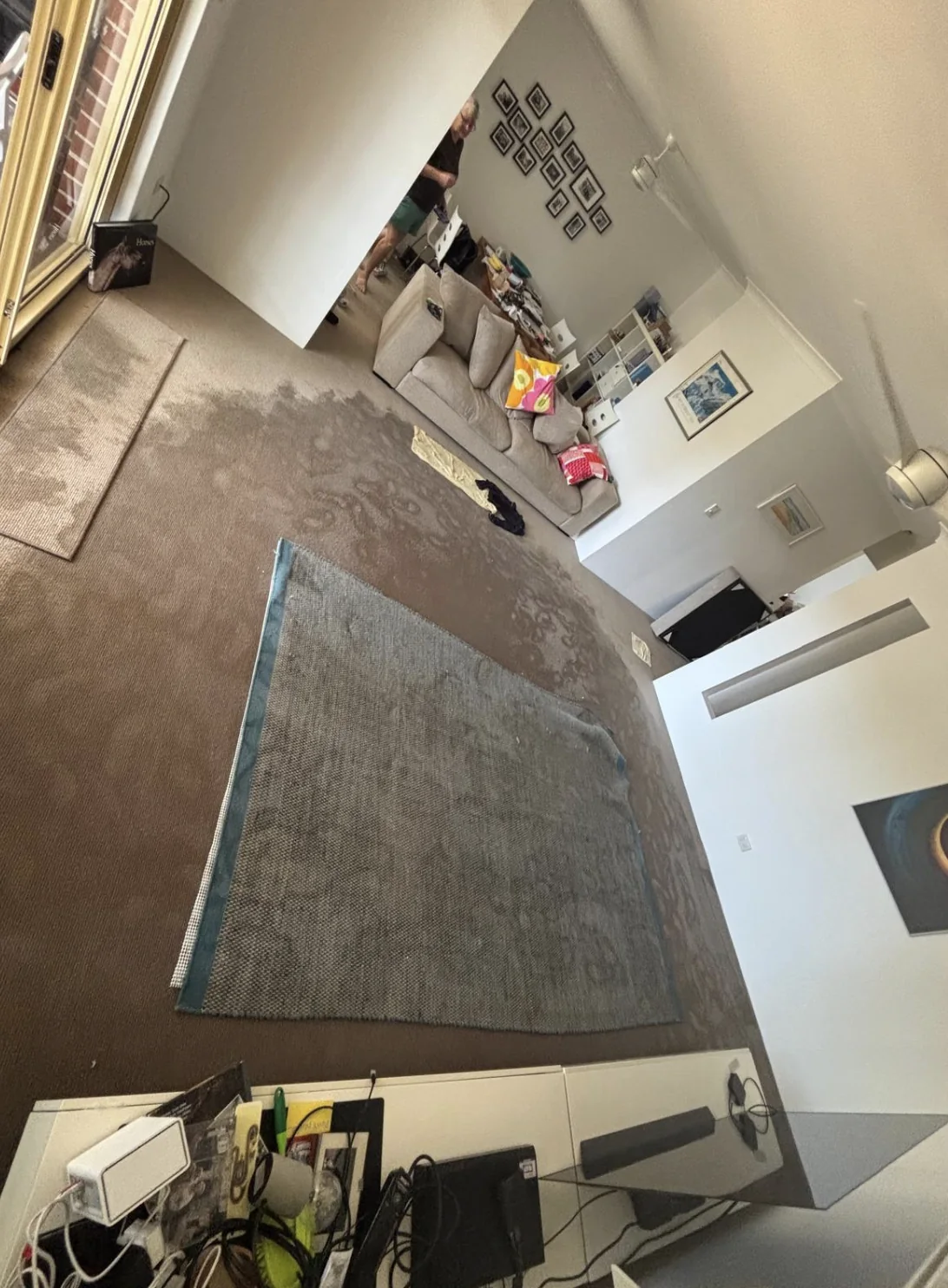 Affected carpet and underlay exposed during water restoration