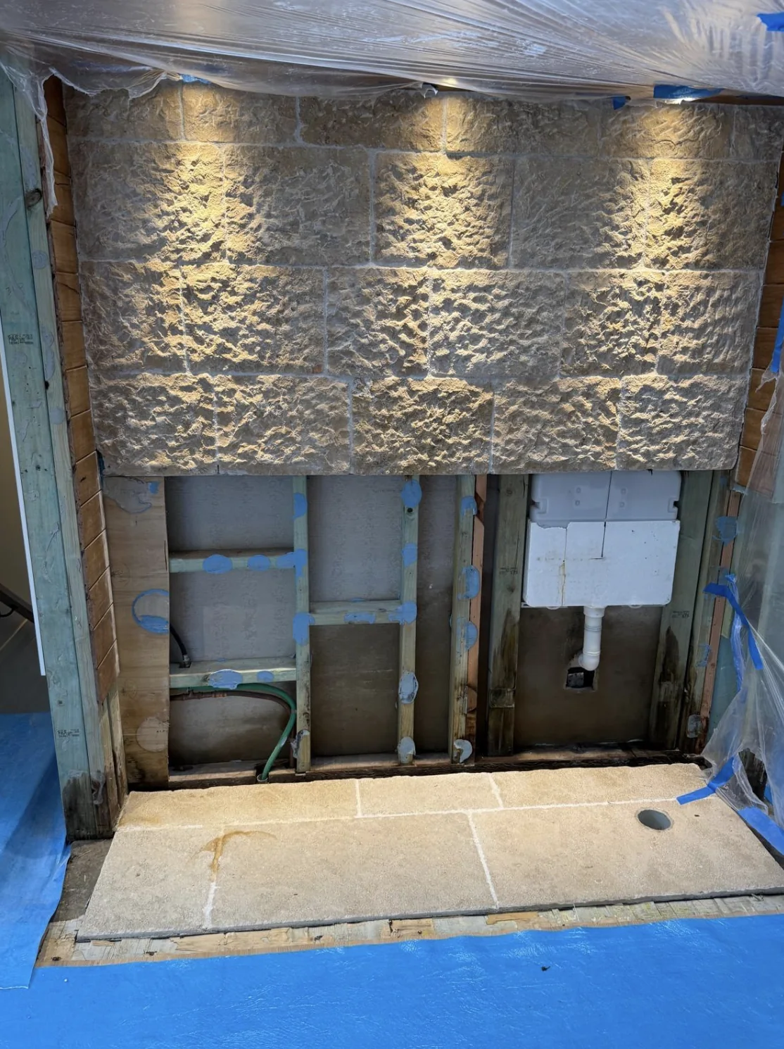Opened wall cavity showing concealed building materials